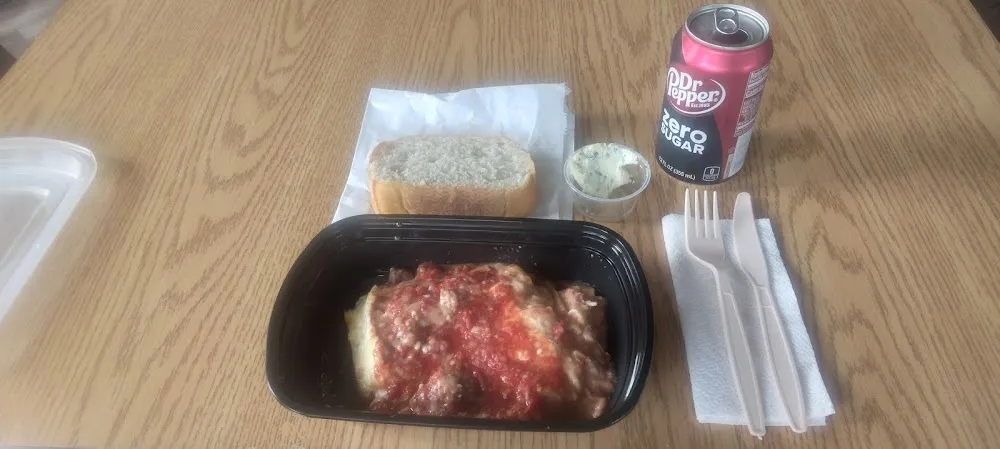 Meat Lasagna with Bread and Drink